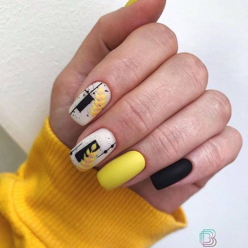 Маникюр желто черный